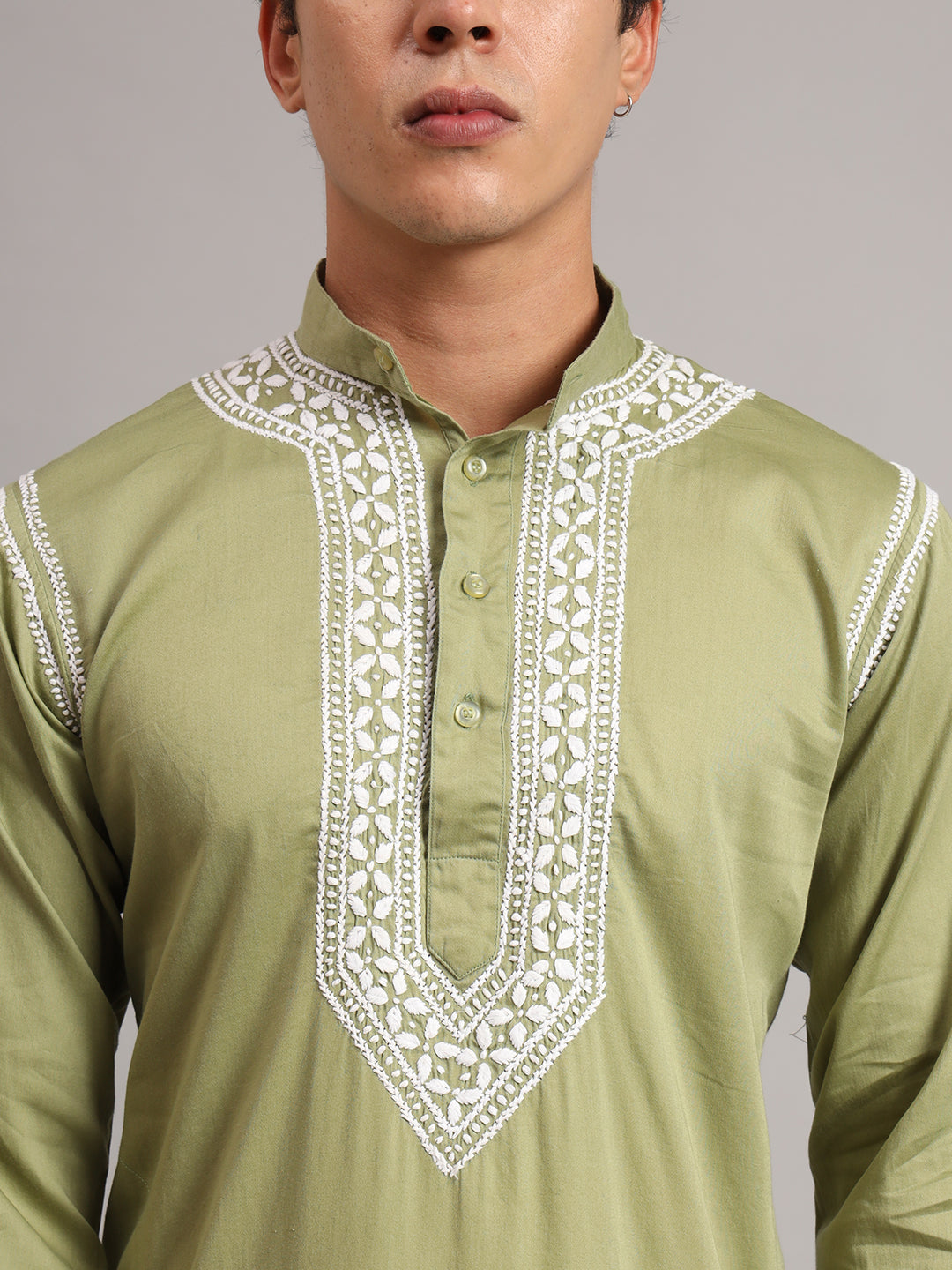 Front view of the Uman Mens Kurta showing a straight silhouette, full sleeves and an embroidered neckline extending into a pointed decorative panel across the chest.