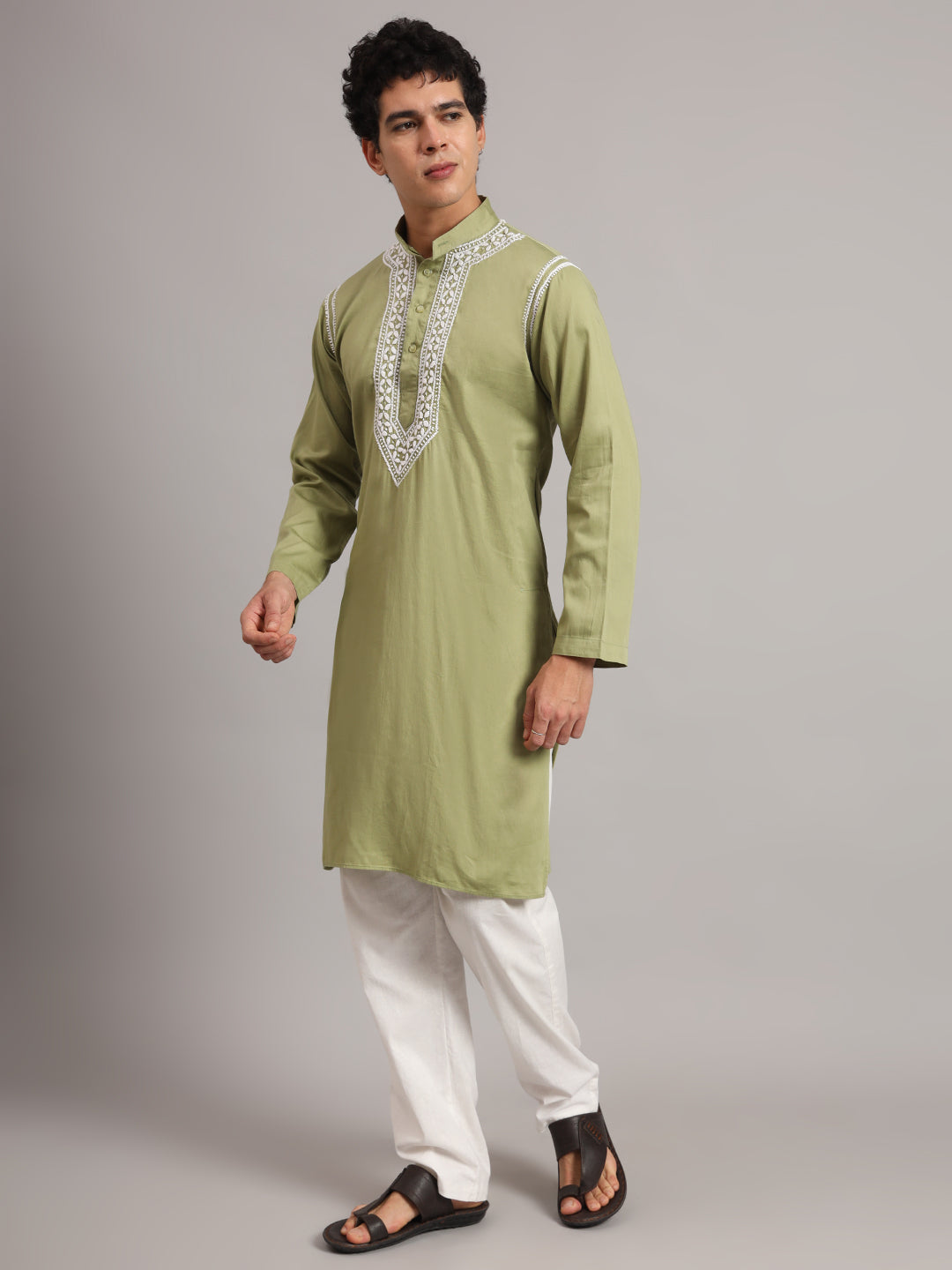 Full-length view of the Uman Mens Kurta highlighting its knee-length design, straight hem, side slits and full sleeves, styled with simple trousers.