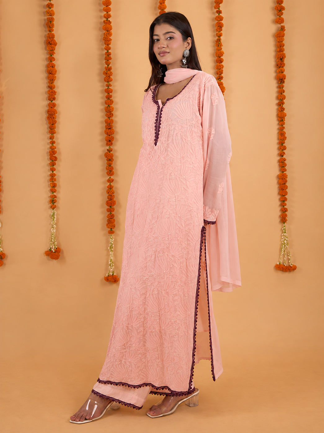 Gulnaar viscose kurti palazzo ensemble with a lace-edged dupatta, showing the coordinated trims across all three pieces of the outfit.
