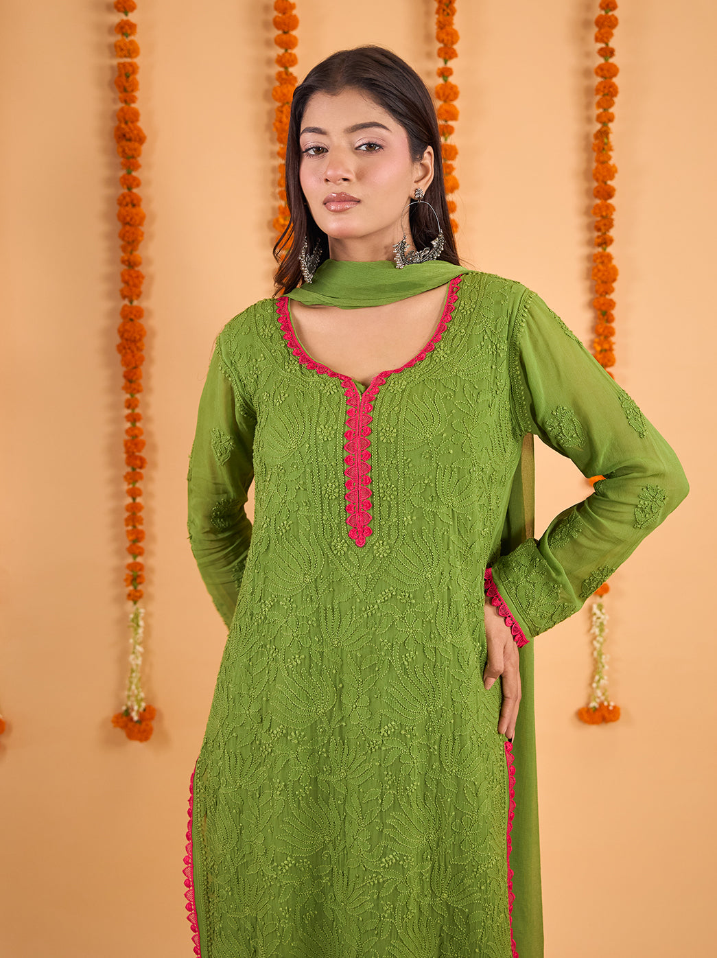 Gulnaar straight kurti and palazzo ensemble featuring tonal floral threadwork, long sleeves and scalloped lace detailing for a coordinated festive outfit.