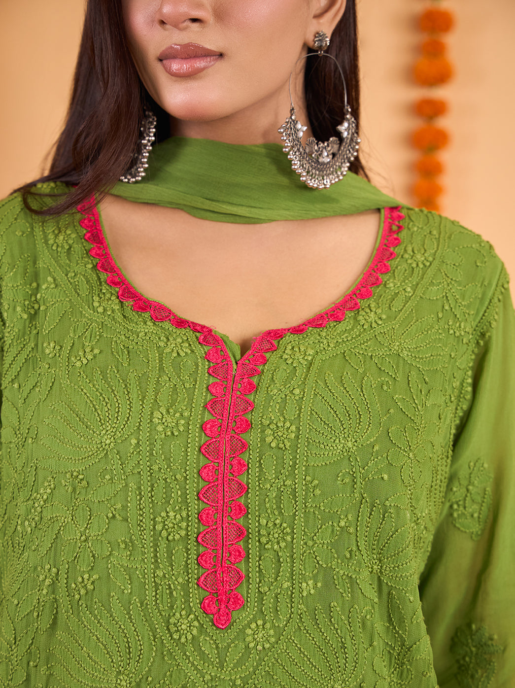 Front-facing model wearing the Gulnaar Viscose Straight Kurti Palazzo Set with Dupatta, highlighting the flowing fabric and detailed embroidery across the kurti.