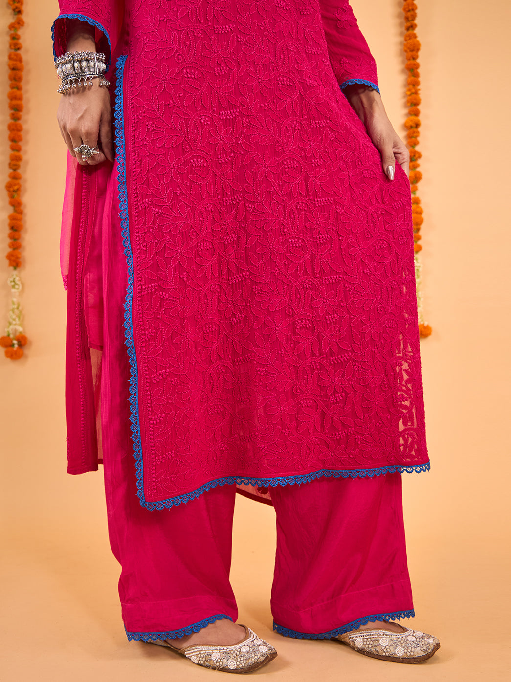 Detailed view of the Gulnaar kurti’s floral embroidery, showing textured threadwork arranged in flowing botanical patterns across the viscose fabric.