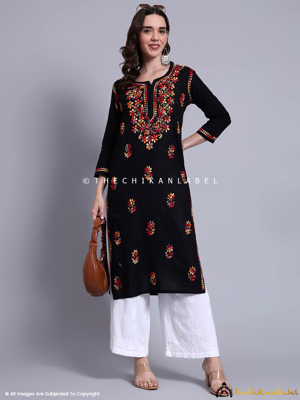 Pure cotton kurti with intricate floral threadwork and full sleeves, designed for comfort and elegance in everyday ethnicwear.

