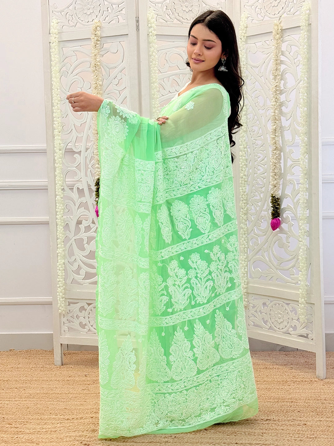 Festive chikankari saree perfect for weddings, pujas, and formal events, handcrafted for a refined ethnic look.
