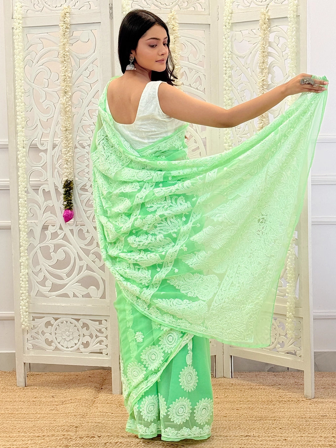 Elegant ethnic wear saree with premium georgette fabric and intricate hand-stitched chikankari designs.