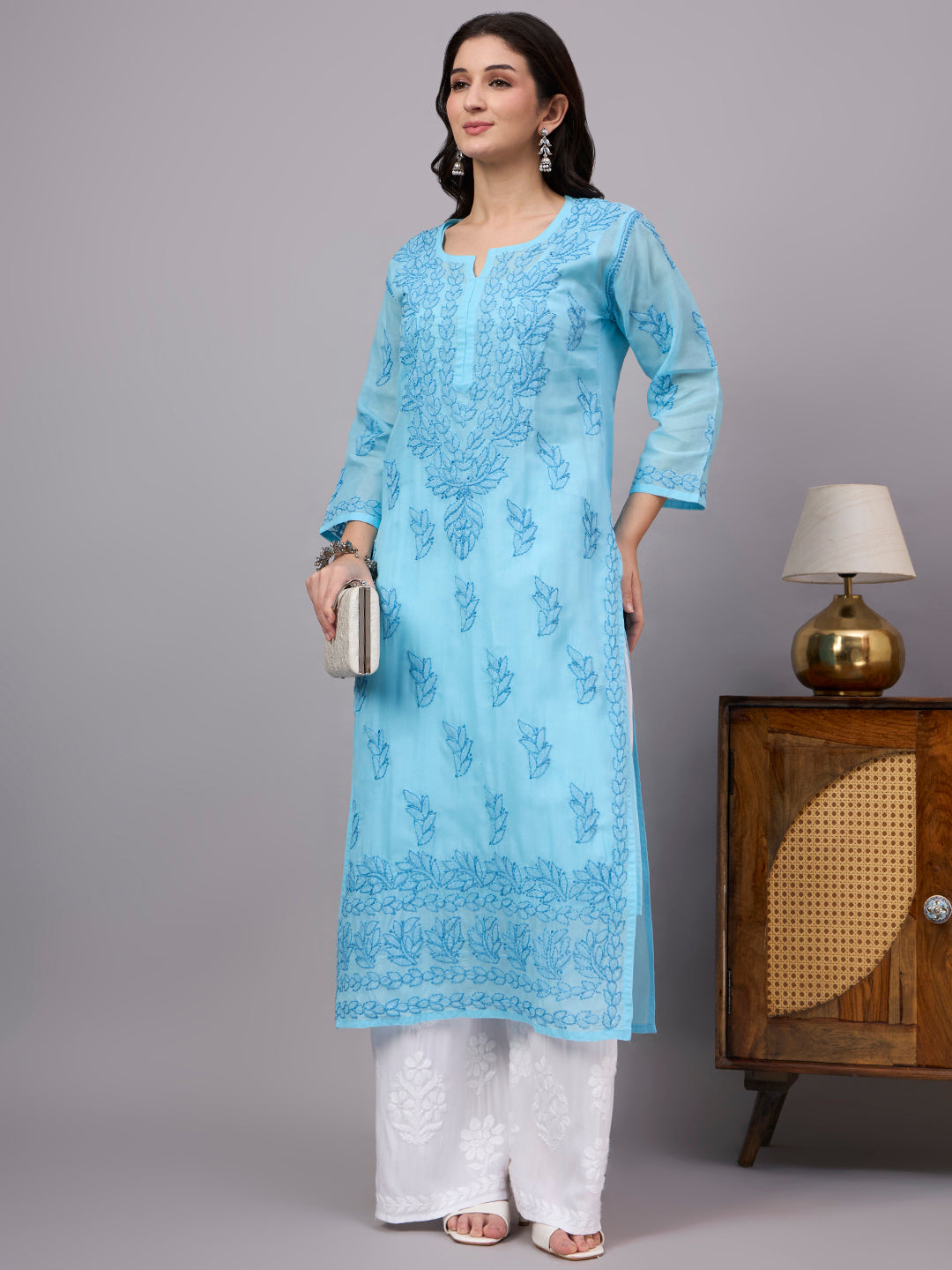 Comfortable regular wear Chikankari Kurta made from premium cotton fabric with handcrafted embroidery and an attached inner for enhanced comfort and coverage.