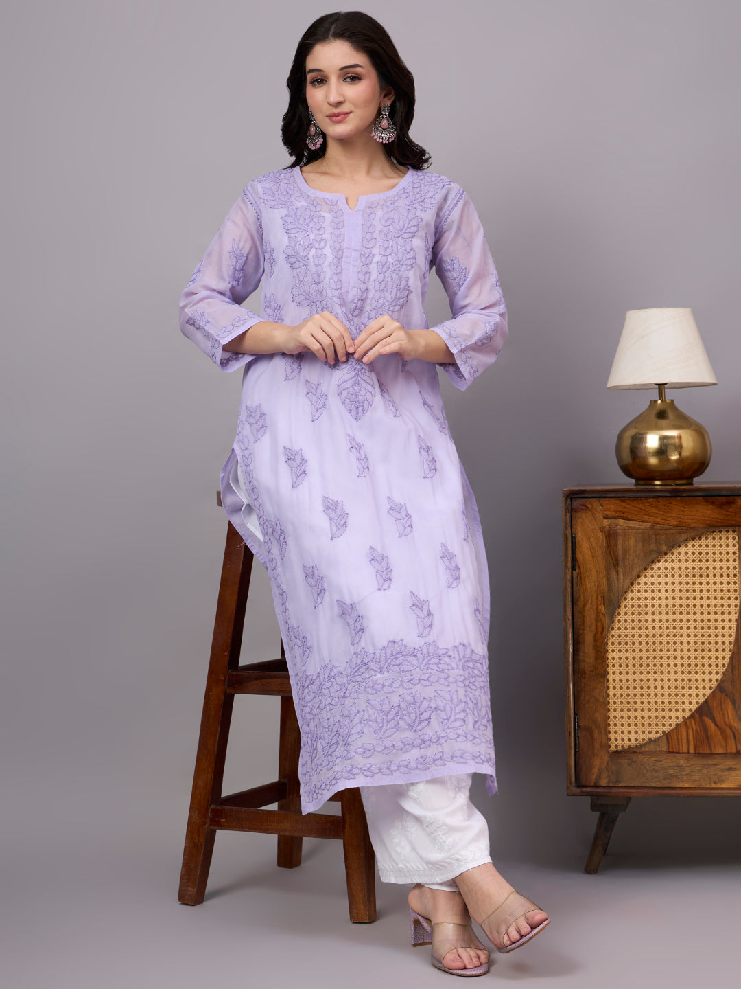 Women's handcrafted Cotton Straight Kurti with authentic floral Chikankari embroidery, comfortable regular fit, and breathable fabric for daily wear and festive occasions.