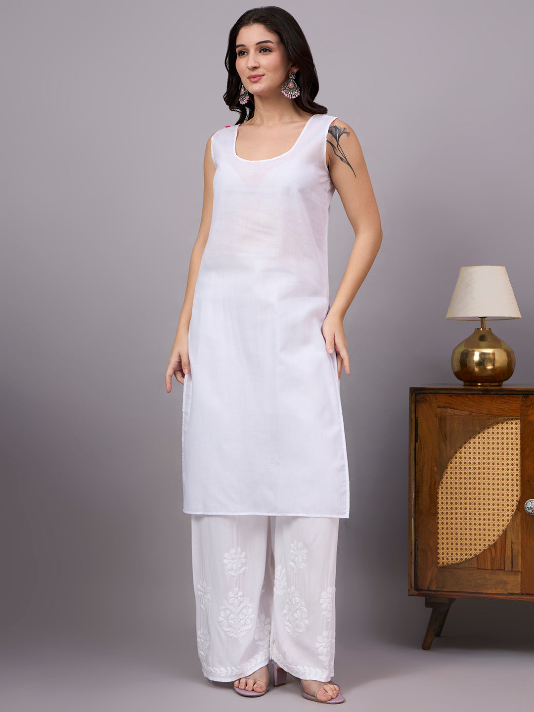 Traditional Cotton kurta with inner featuring artisan-crafted Chikankari embroidery, straight-cut design, and lightweight comfort for modern ethnic wardrobes.