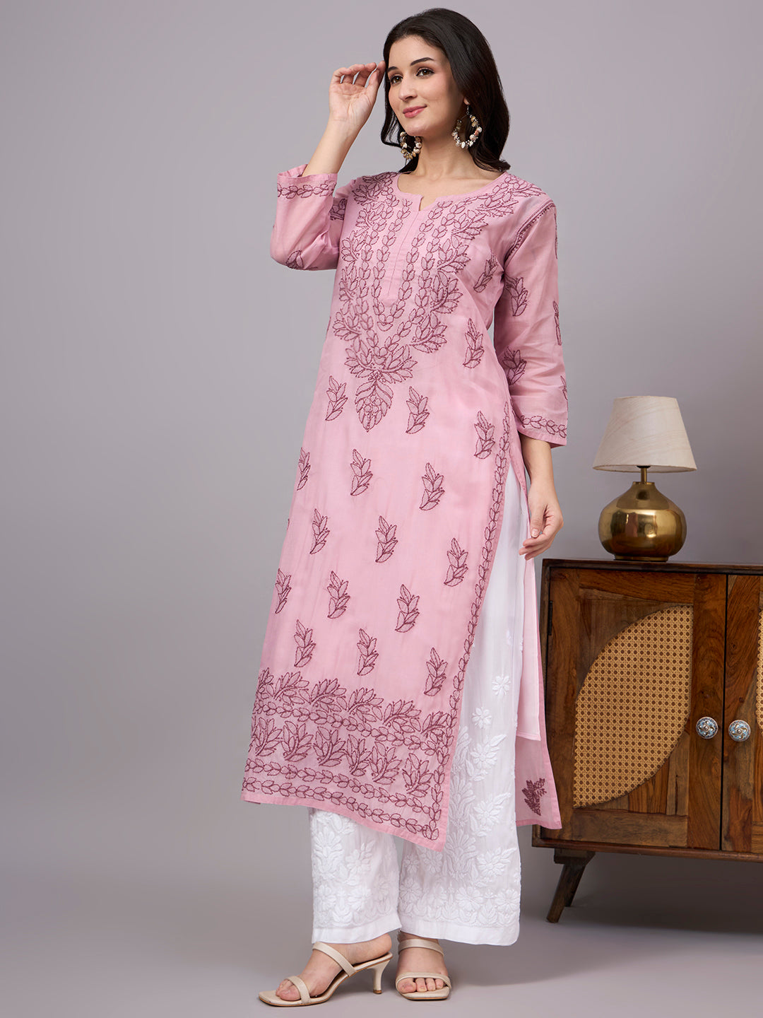 Women's handcrafted Cotton Straight Kurti with authentic floral Chikankari embroidery, comfortable regular fit, and breathable fabric for daily wear and festive occasions.