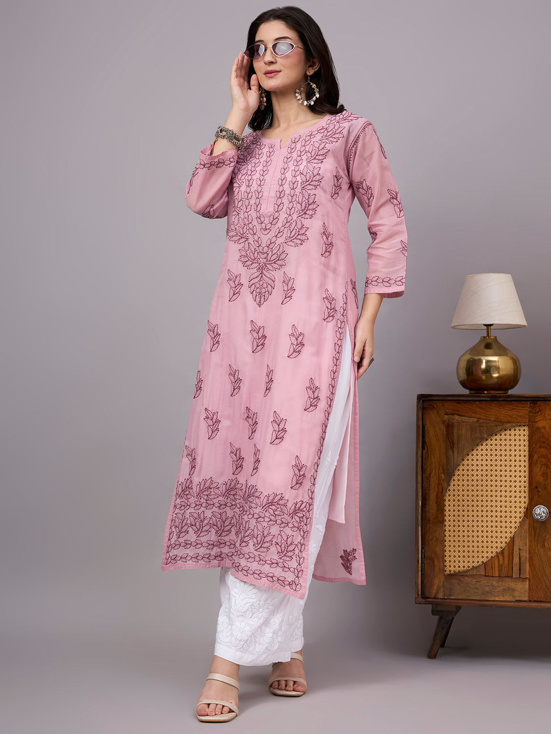 Comfortable regular wear Chikankari Kurta made from premium cotton fabric with handcrafted embroidery and an attached inner for enhanced comfort and coverage.
