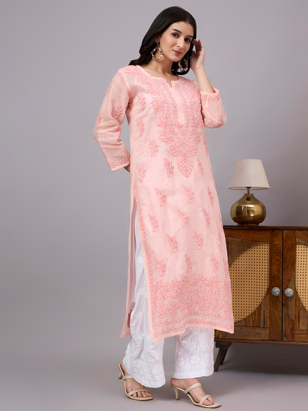 Premium Cotton Straight Kurti showcasing handcrafted Chikankari embroidery with a classic straight fit, soft inner lining, and versatile ethnic styling.