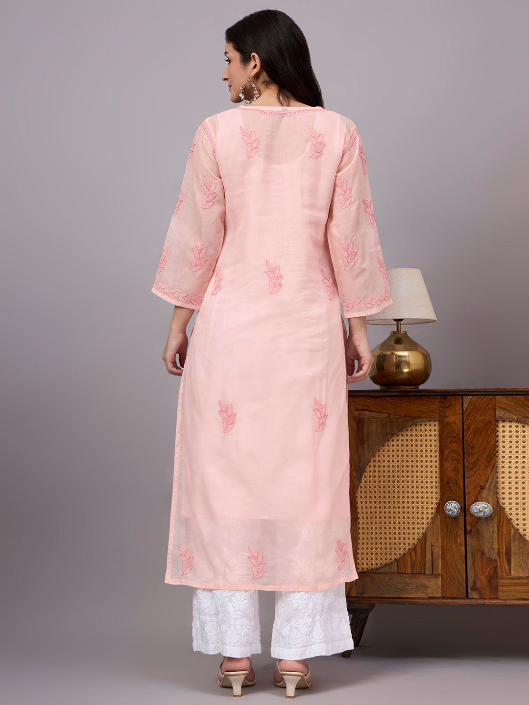 Handcrafted Chikankari Kurta with intricate traditional embroidery, premium cotton fabric, and comfortable straight silhouette ideal for office wear and casual outings.