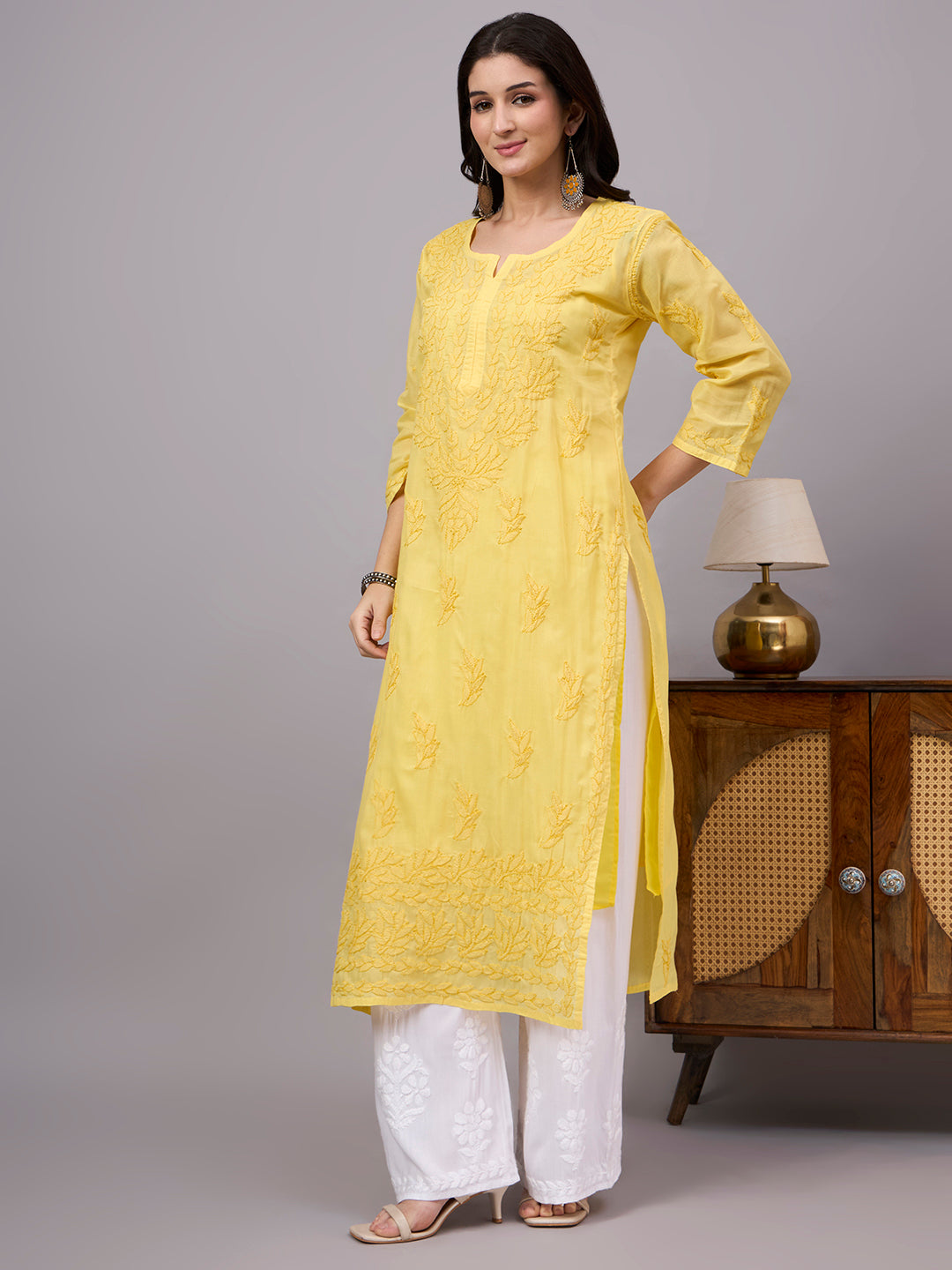 Premium Cotton kurta with inner featuring intricate handcrafted Chikankari embroidery, breathable cotton fabric, and a flattering straight silhouette for everyday elegance.
