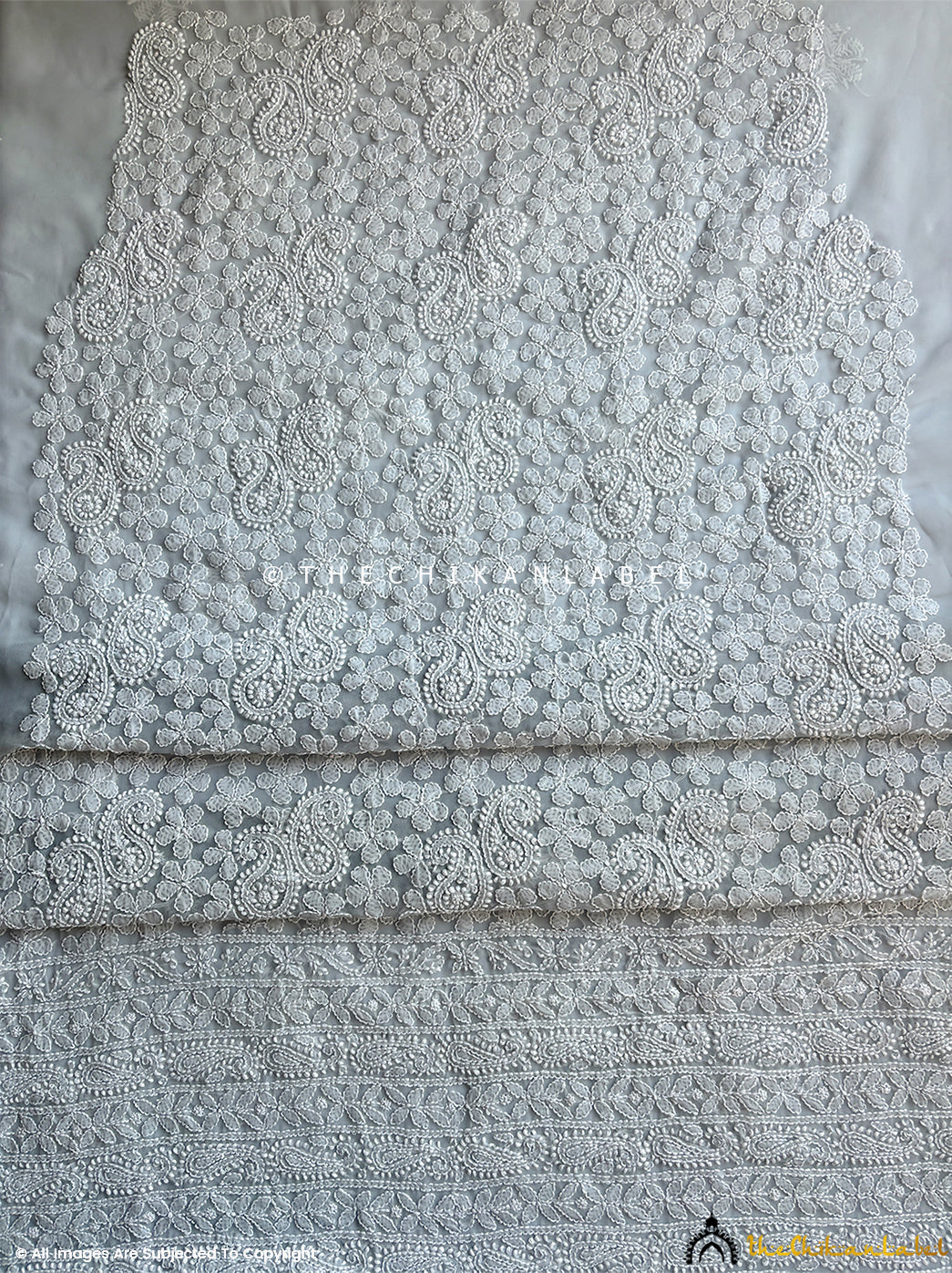 “Georgette chikankari suit material with dupatta highlighting traditional motifs and delicate threadwork”