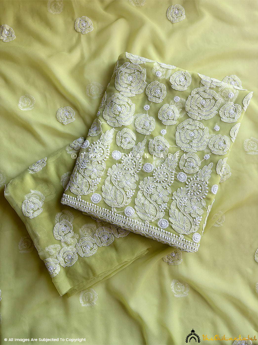 “Unstitched georgette chikankari suit piece with dupatta featuring traditional hand embroidery and floral motifs”