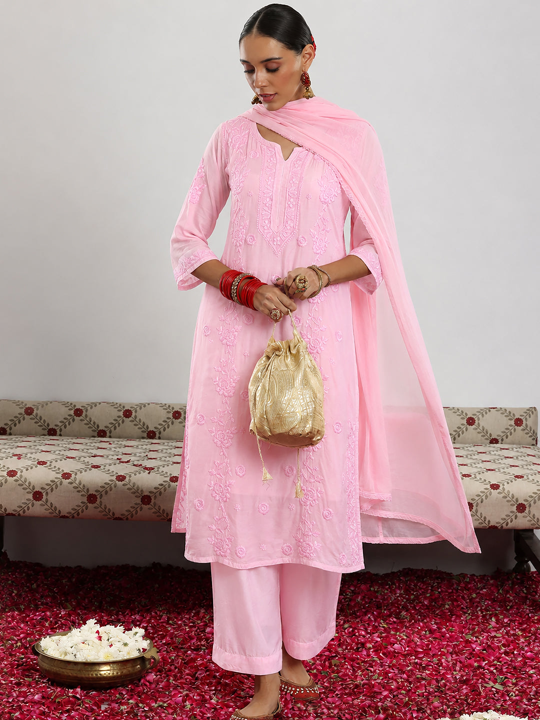 Muslin Chikankari Straight Kurta Set with Dupatta featuring intricate traditional embroidery, matching palazzo bottoms and a lightweight dupatta for elegant everyday ethnic wear.