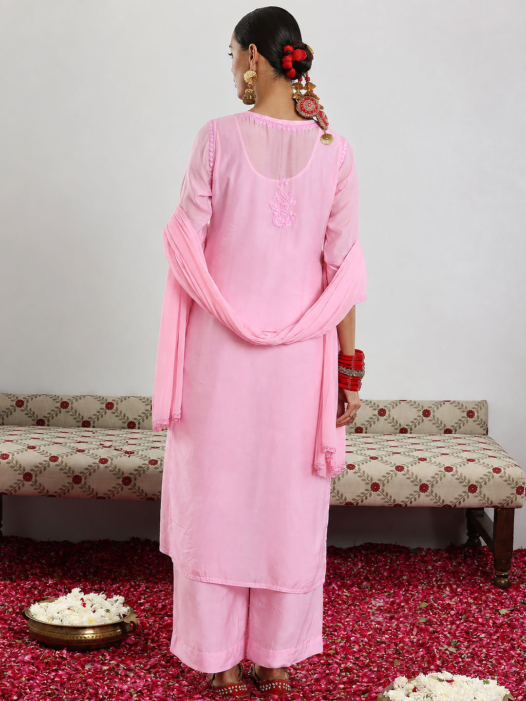 Elegant Muslin Chikankari Straight Kurta Set with Dupatta showcasing detailed handcrafted embroidery across the kurta with a graceful straight-fit ethnic silhouette.