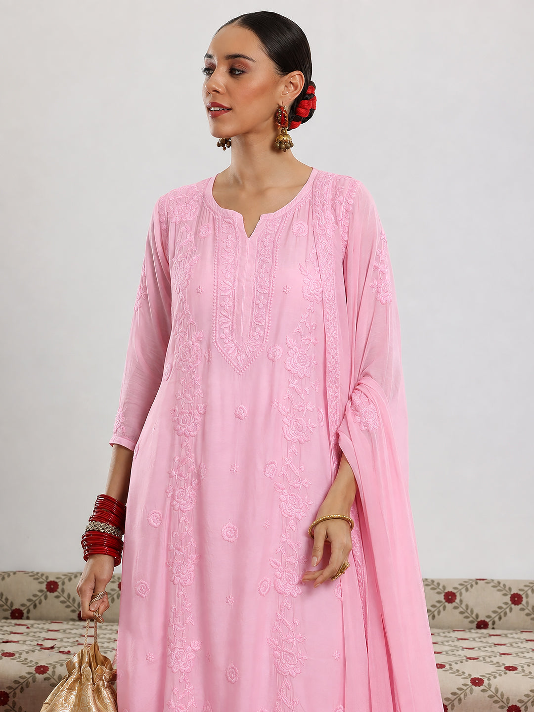 Chikankari muslin set for women featuring a straight embroidered kurta, coordinated wide-leg bottoms and dupatta designed for comfortable regular wear.