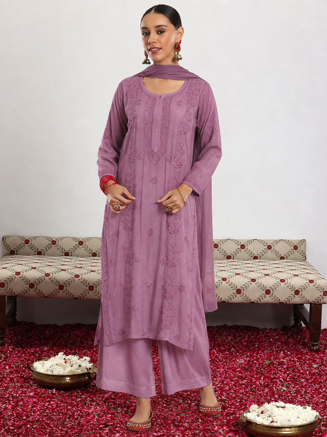 Trending Chikankari set for women with a breathable muslin straight kurta, intricate Lucknowi-inspired embroidery, relaxed bottoms and an elegant matching dupatta.