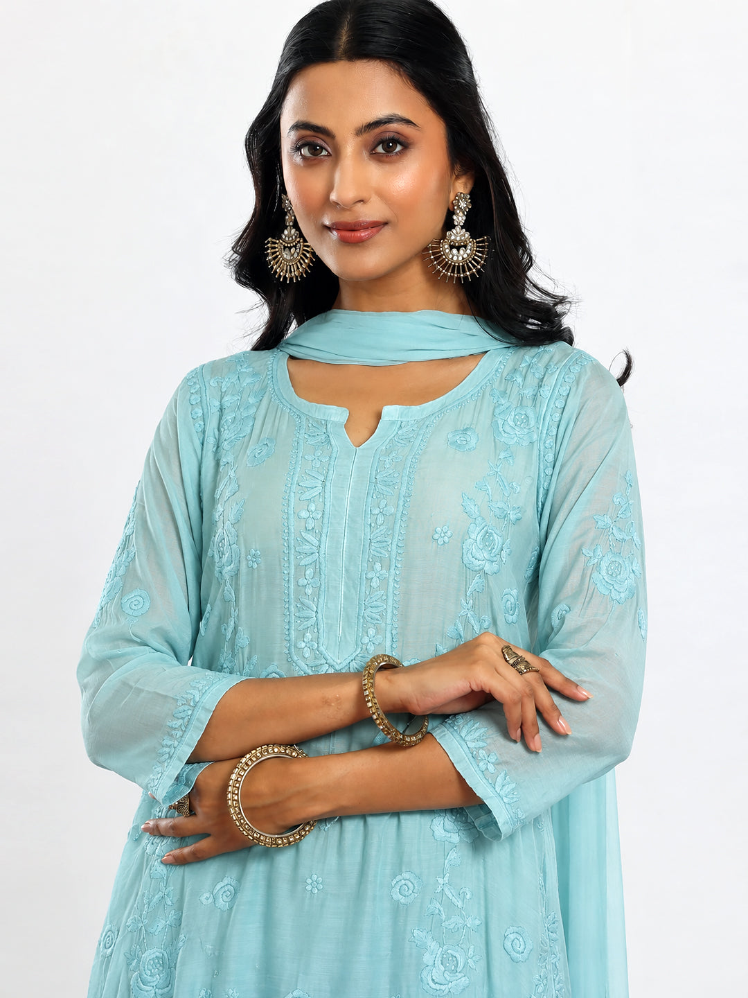 Comfortable regular wear muslin kurta set for women with an embroidered straight kurti, spacious palazzo bottoms and coordinated dupatta for effortless all-day styling.