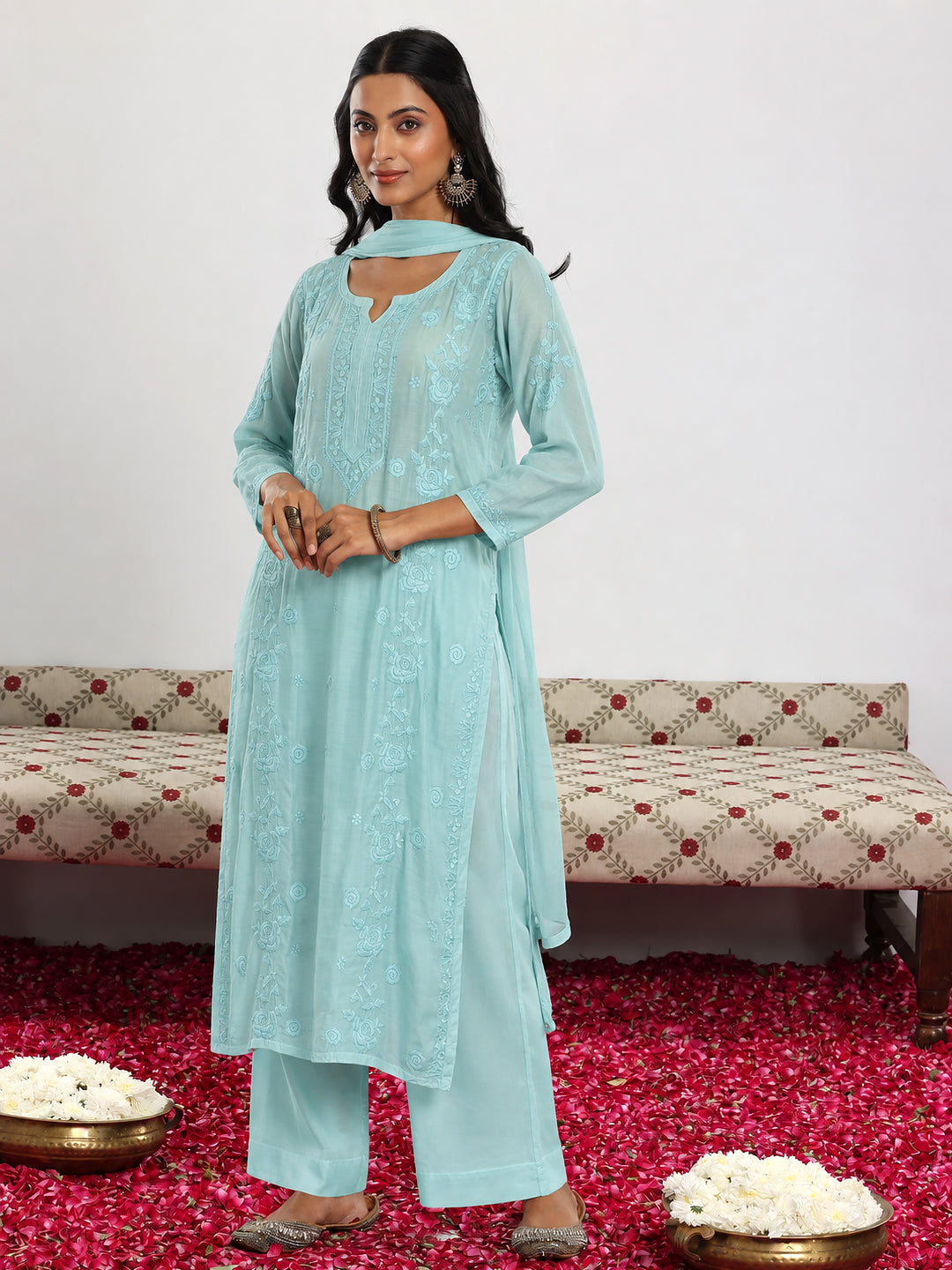 Women’s embroidered muslin kurta set with straight kurti, three-quarter sleeves, wide-leg palazzo and matching dupatta suitable for brunches and family gatherings.