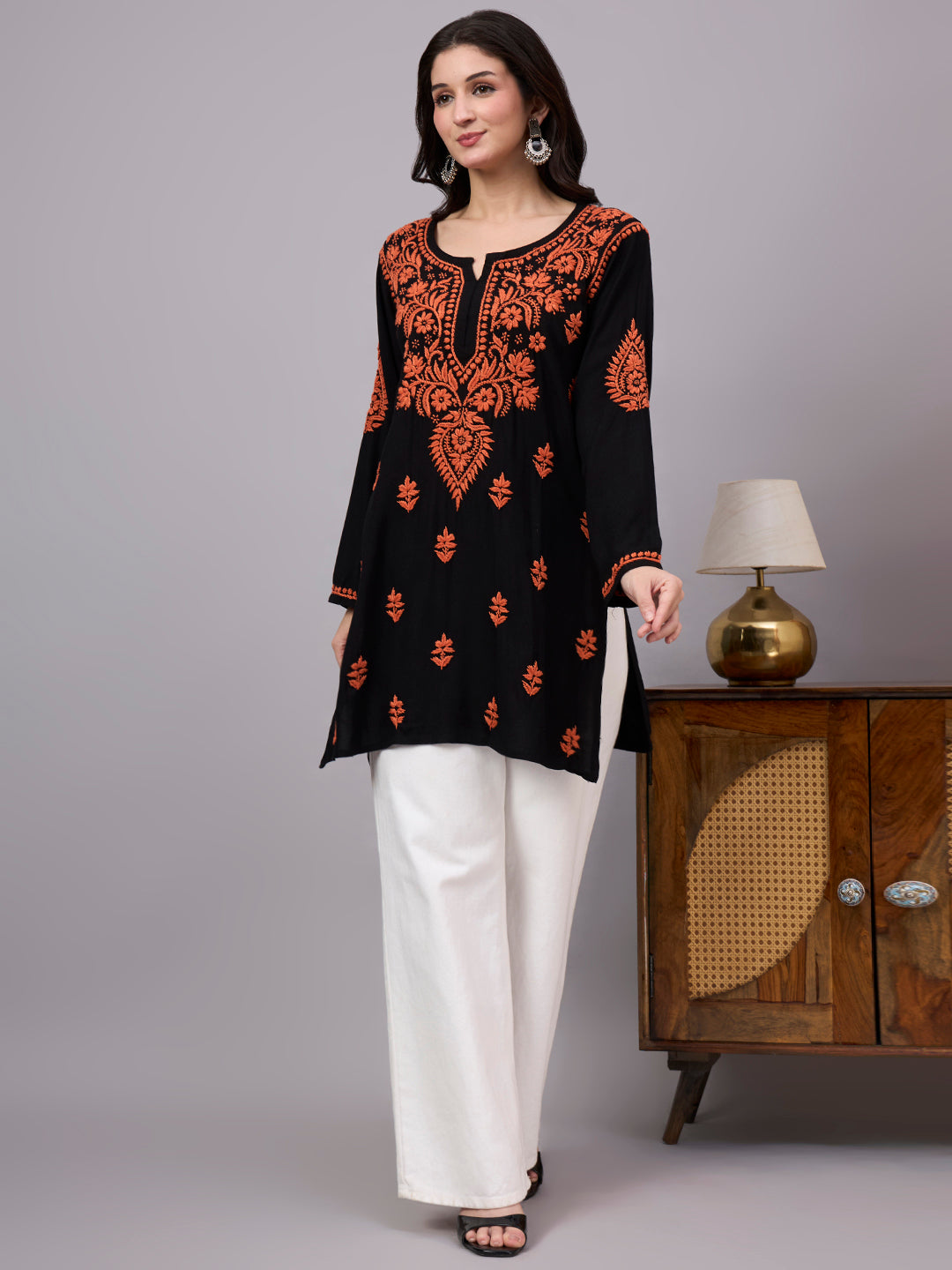 Traditional Rayon Short Kurta with artisan-made Chikankari embroidery, soft fabric texture, and contemporary ethnic style for modern women's wardrobes.