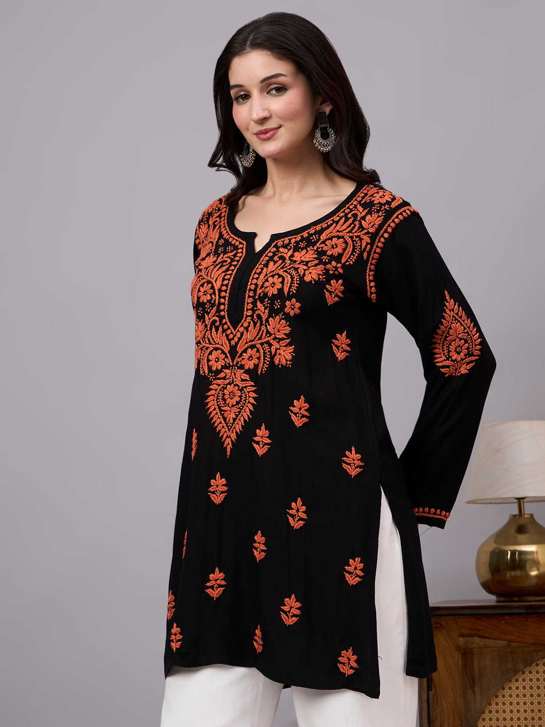Stylish trending short kurti crafted with premium rayon fabric and handcrafted Lucknow Chikankari work, perfect for daily wear, travel, and casual occasions.