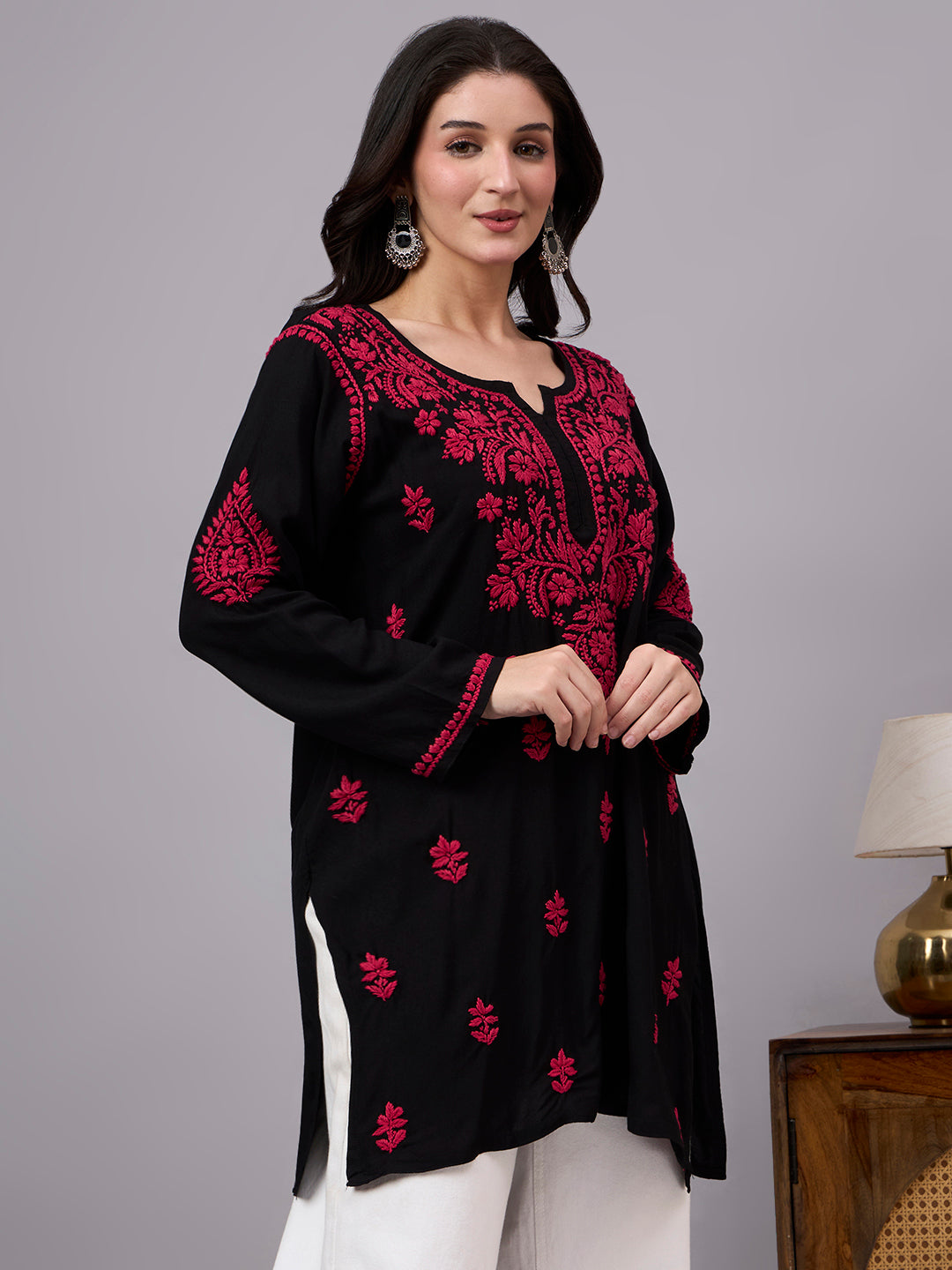 Women's ethnic Chikankari kurti inspired by Lucknow artistry with detailed handcrafted embroidery, soft rayon fabric, and timeless everyday elegance.