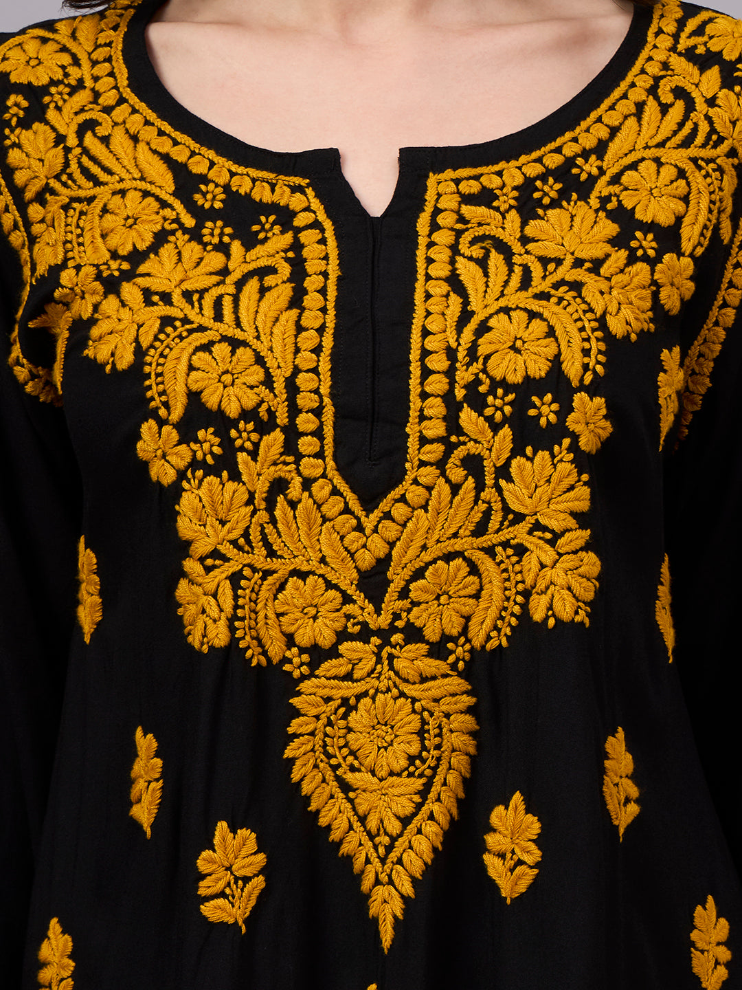 Premium Chikankari kurti crafted from soft rayon fabric with intricate handcrafted embroidery, offering a stylish and comfortable regular wear top for women.