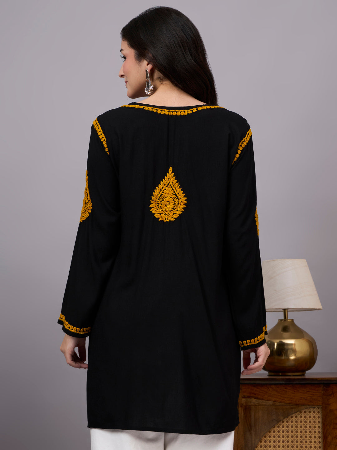 Elegant Rayon Short Kurta showcasing traditional Lucknow Chikankari craftsmanship with breathable fabric, full sleeves, and versatile daily wear appeal.
