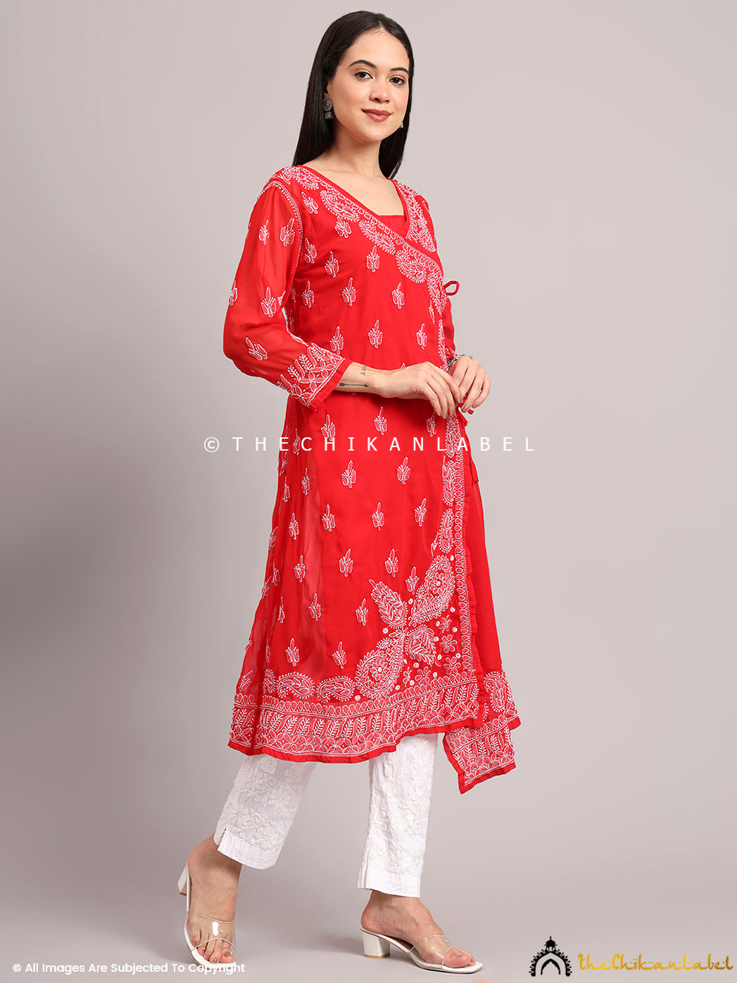 Elegant georgette Angrakha kurta adorned with delicate Chikankari embroidery, styled with white bottoms for a summer-ready look

