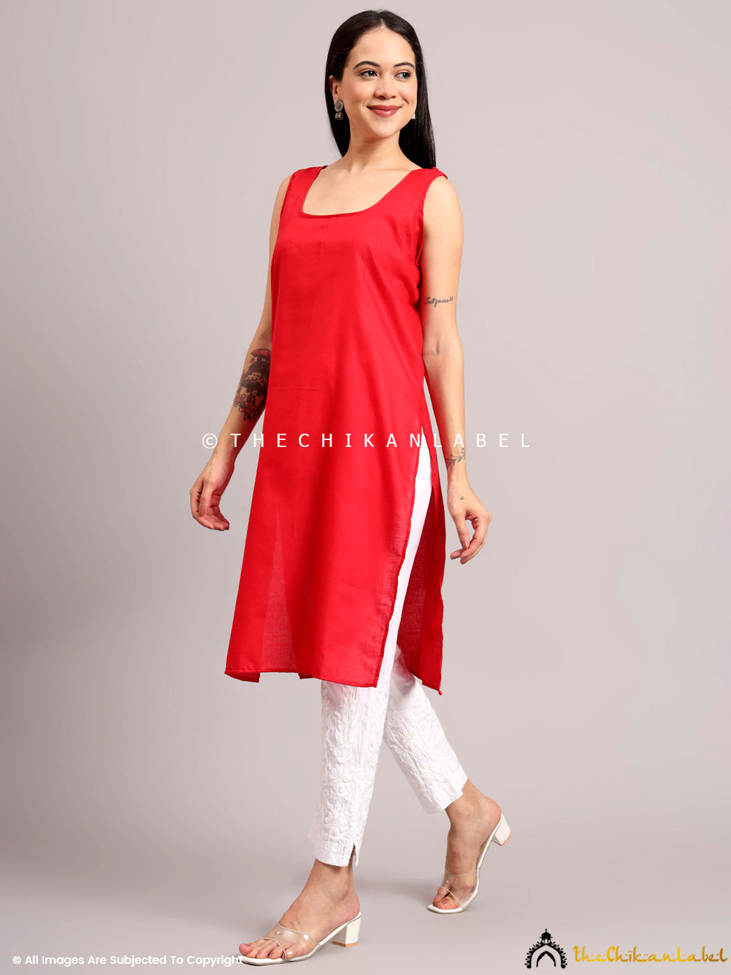 Full-length georgette Angrakha kurta featuring traditional embroidery and a flattering asymmetrical wrap style

