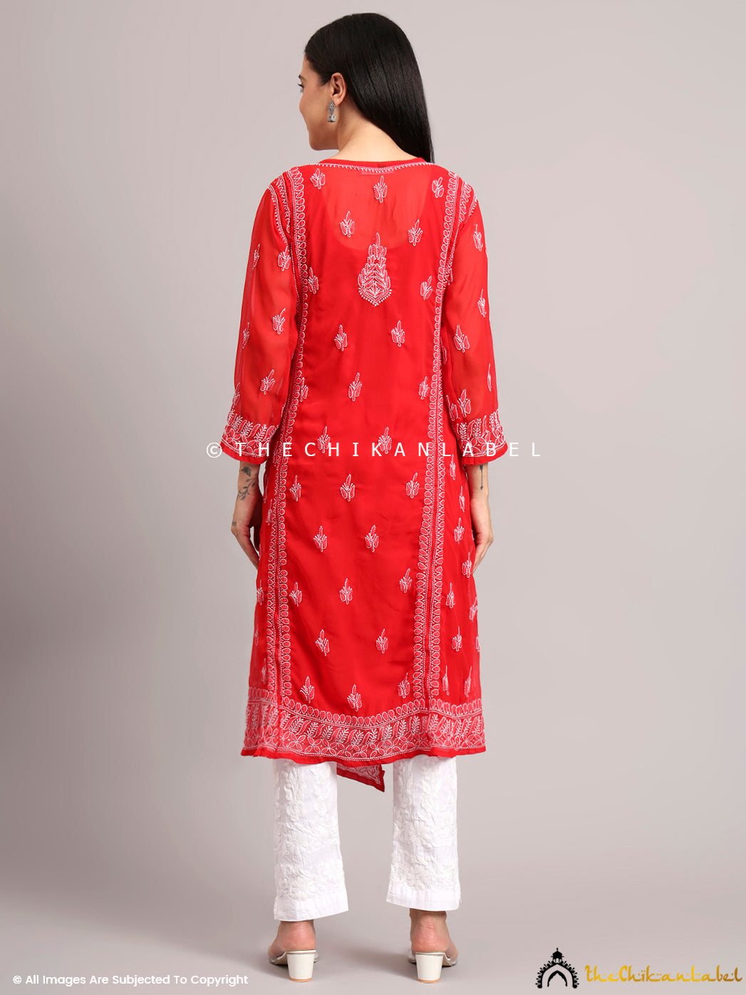 Flowing Angrakha kurta made from breathable georgette fabric, featuring intricate Chikankari details ideal for summer ethnic wear

