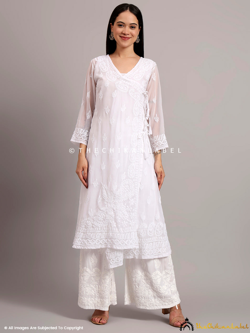 Georgette Chikankari Angrakha kurta designed with three-quarter sleeves and side tie-up, ideal for summer casual wear

