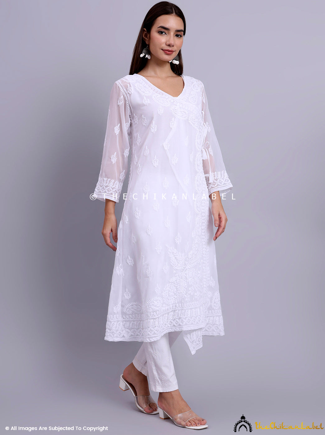 Full-length georgette angrakha kurti with sheer sleeves and traditional hand embroidery from Lucknow.

