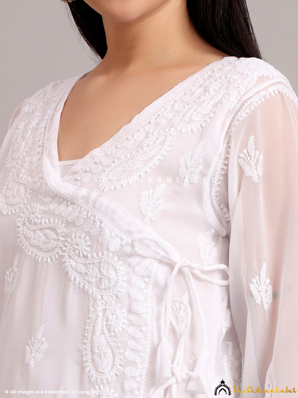 Stylish and breathable Angrakha kurta with detailed hand embroidery, worn as comfortable yet festive summer ethnic wear


