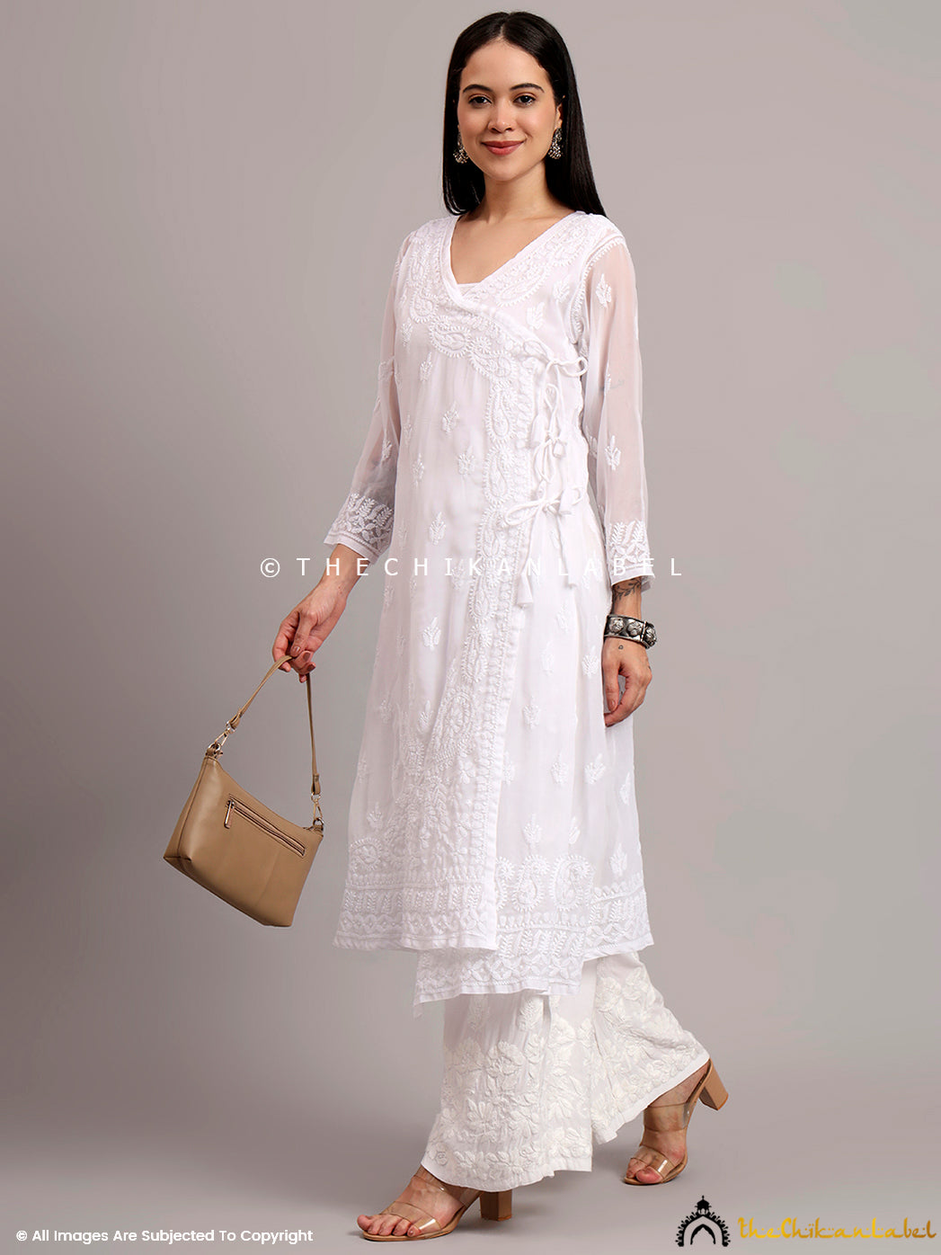 Ethnic georgette Angrakha kurta with intricate Chikankari accents styled for daily wear, brunches, or festive occasions

