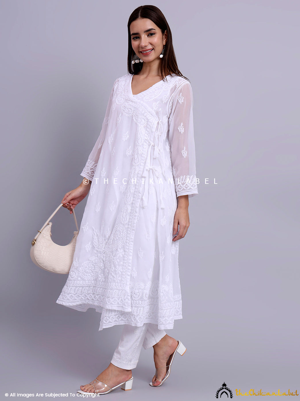 Traditional chikankari angrakha made in breathable georgette fabric with delicate threadwork and tie-up side knot.

