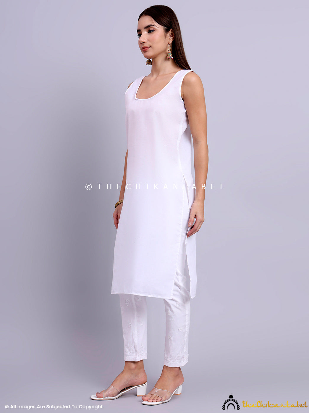 Lightweight angrakha kurti with transparent sleeves and detailed chikankari embroidery all over the body.

