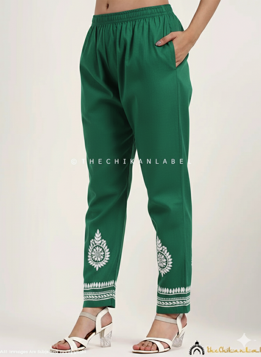 Premium cotton chikankari kurta set for women with intricate hand embroidery and matching embroidered pants styled elegantly