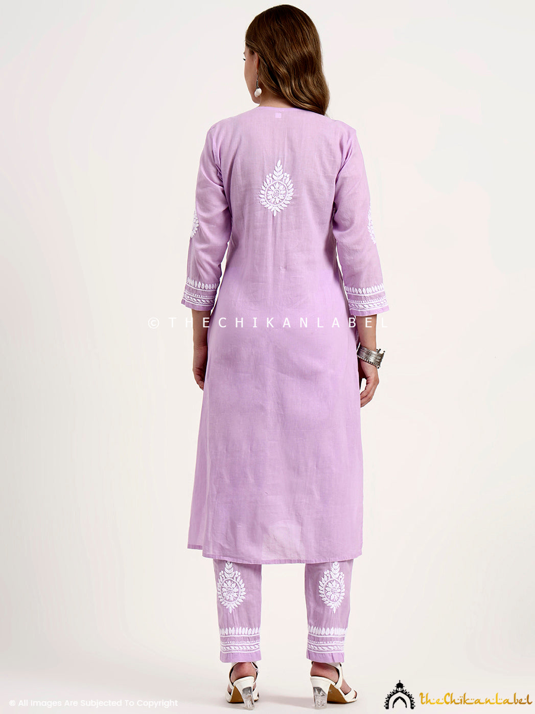 Trending chikankari kurta set in khadi cotton with artisan embroidery and matching bottoms for a complete ethnic look.