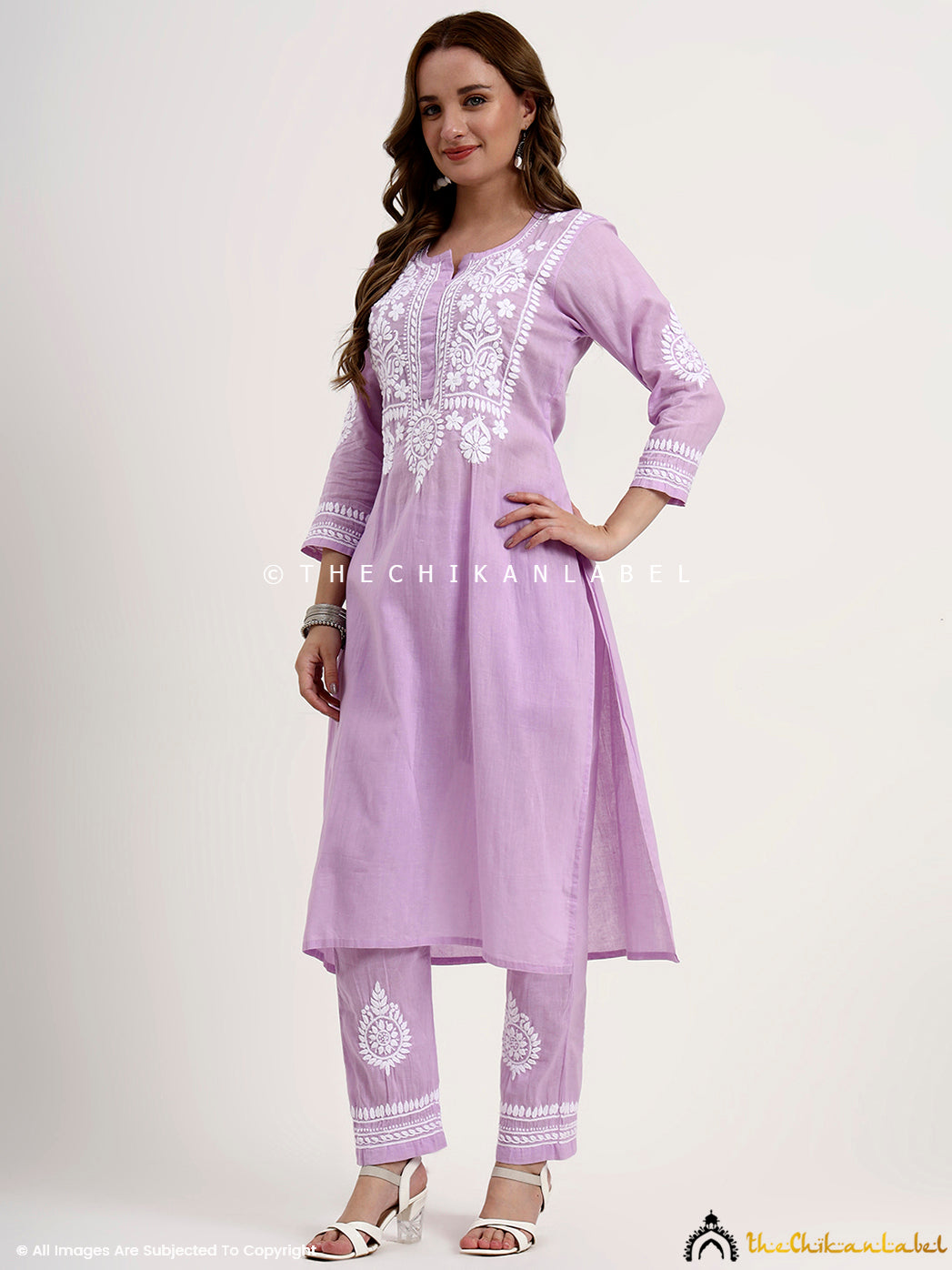 Authentic chikankari kurta set with handcrafted embroidery on khadi cotton fabric designed for comfort and style.