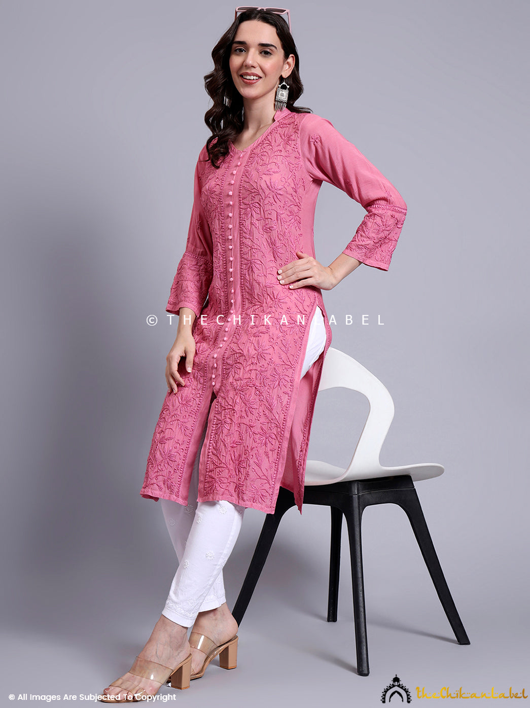 Front open kurti with delicate tonal embroidery and button-down detail crafted in breathable muslin.

