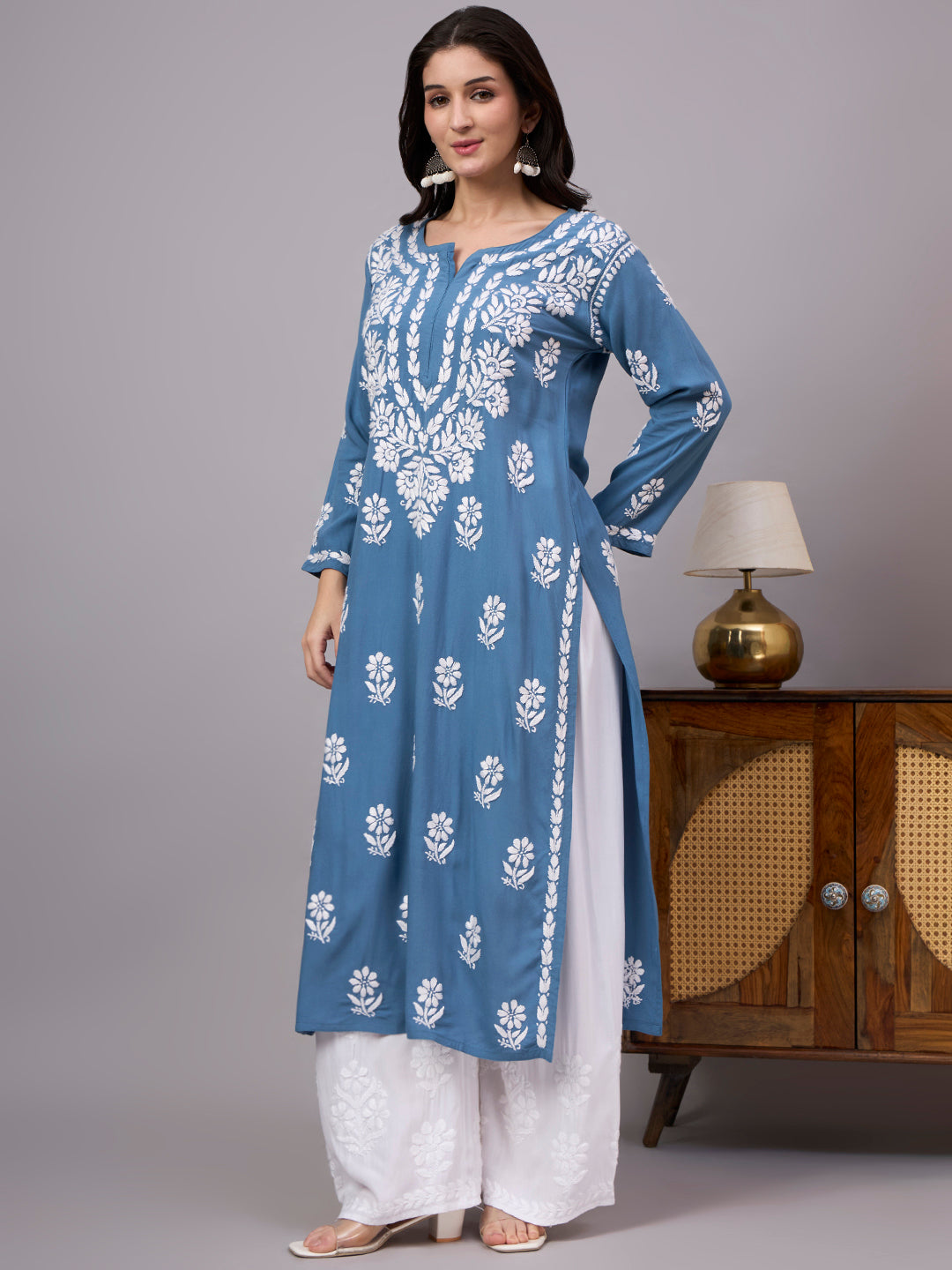 Elegant women's Chikankari Kurta showcasing authentic handcrafted floral embroidery on premium rayon fabric, designed for comfort, style, and all-day wear.