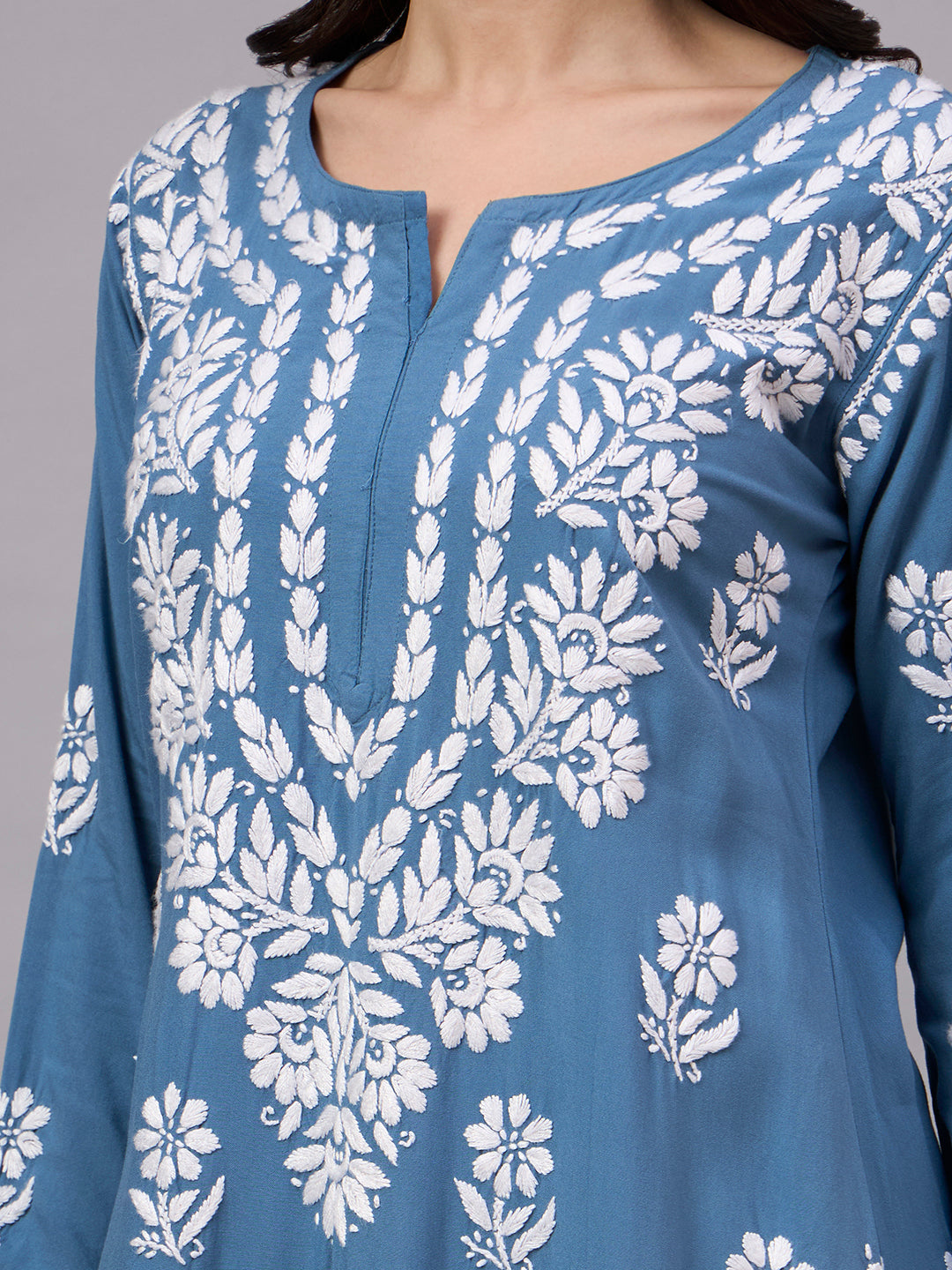 Premium Chikankari Kurta for women crafted from soft rayon fabric with intricate handcrafted embroidery, making it a comfortable regular wear kurti for office and casual outings.