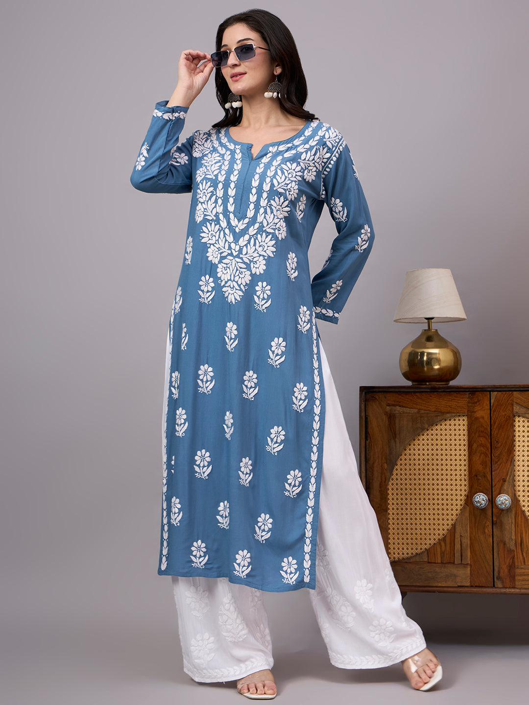 Women's ethnic Rayon Straight Kurti featuring traditional Lucknow Chikankari craftsmanship, soft fabric, full sleeves, and graceful straight-cut design for effortless elegance.