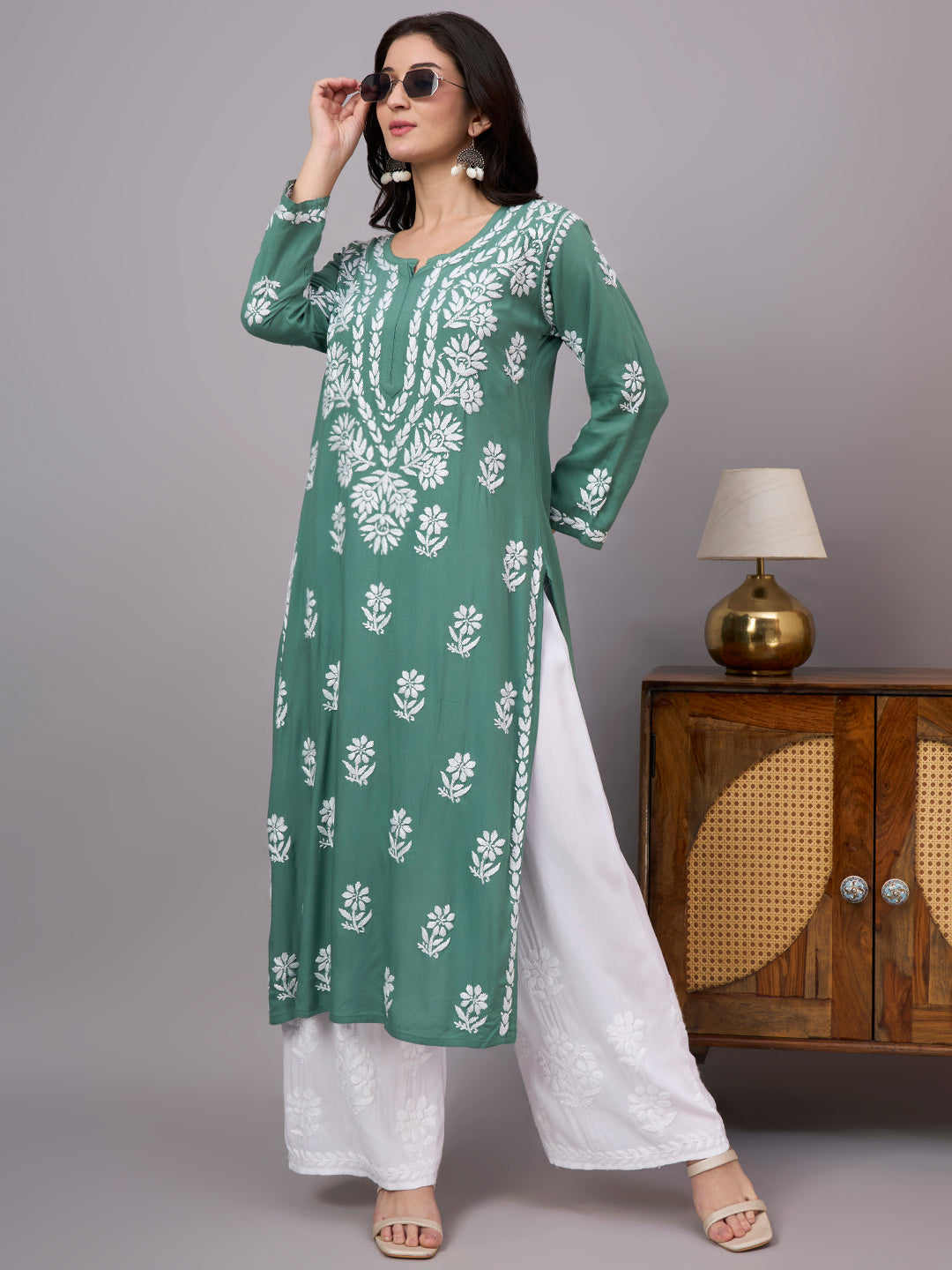 Comfortable regular wear Rayon Straight Kurti with authentic handcrafted Chikankari embroidery, traditional craftsmanship, and modern ethnic fashion suitable for every season.