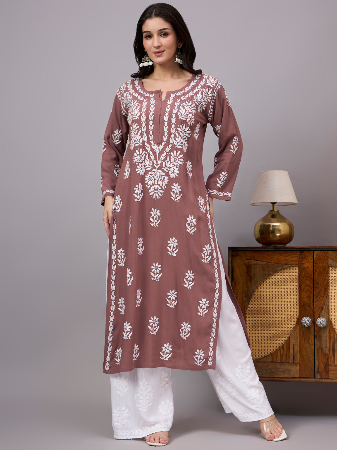 Women's ethnic Rayon Straight Kurti featuring traditional Lucknow Chikankari craftsmanship, soft fabric, full sleeves, and graceful straight-cut design for effortless elegance.