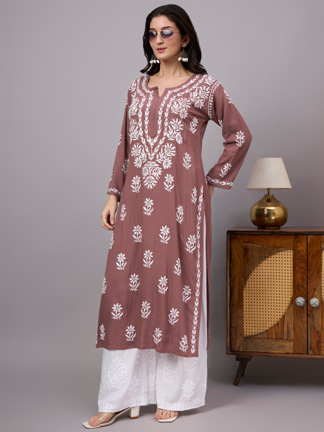 Premium ethnic Rayon Straight Kurti with handcrafted floral Chikankari embroidery, lightweight fabric, and comfortable design ideal for daily wear and special occasions.