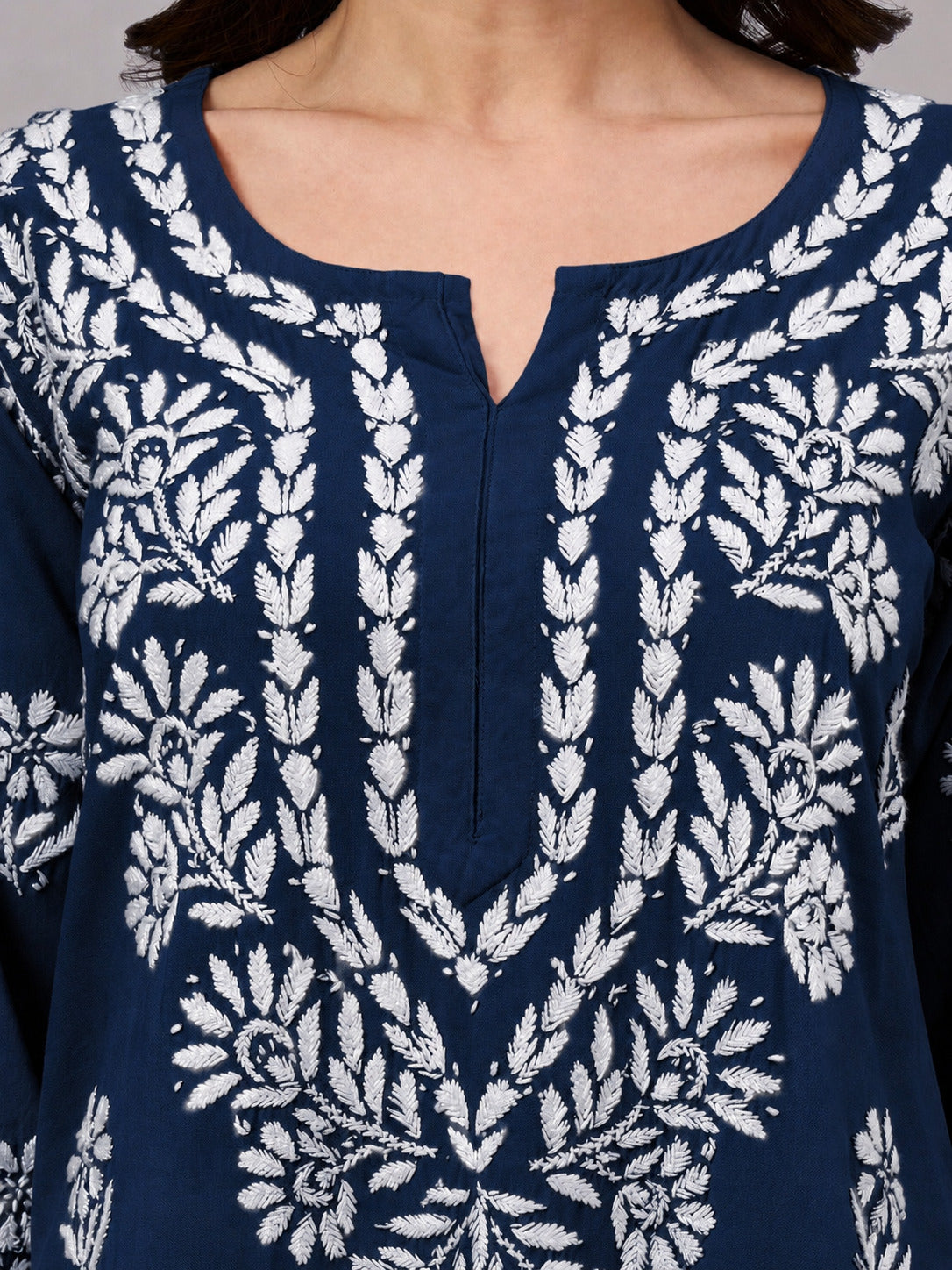 Women's handcrafted Chikankari Kurta with premium rayon fabric, elegant floral embroidery, classic neckline, straight fit, and timeless ethnic design for everyday elegance.